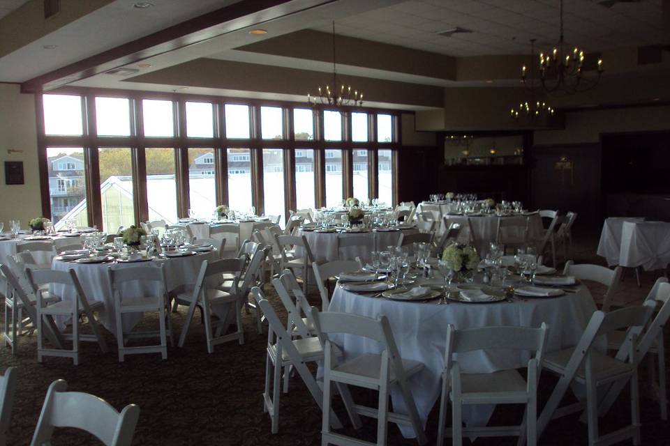 Chair covers and purple sashes.  November reception in the Bay & Cliff Room.  Maximum 225 guests.