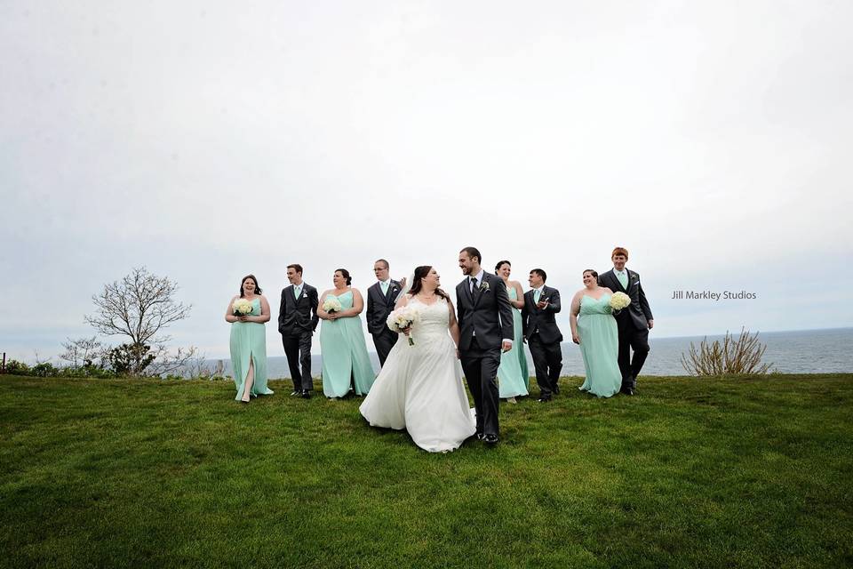 The couple with the bridesmaids and groomsmen