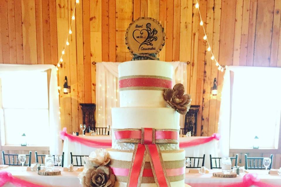 Four tier pink and brown cake