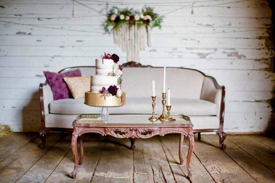 Elegant gold and naked cake