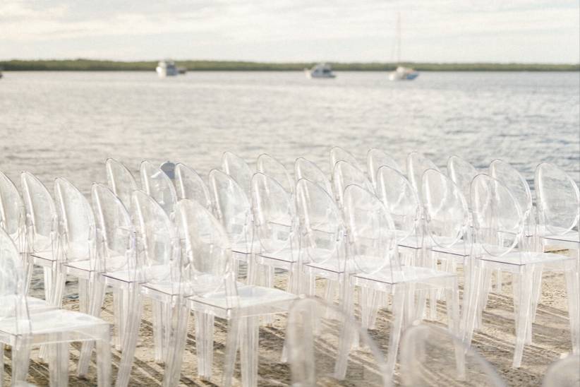Ceremony with ghost chairs