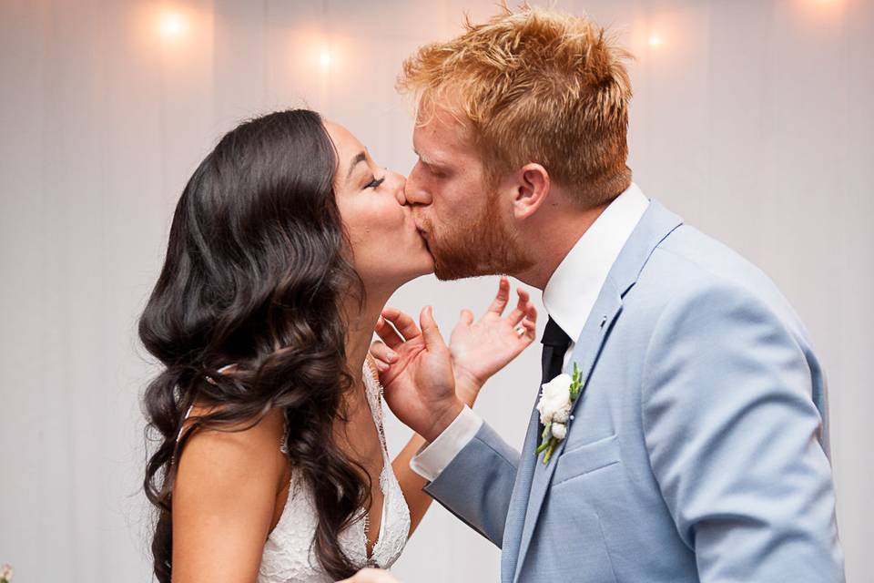 Newlyweds kissing