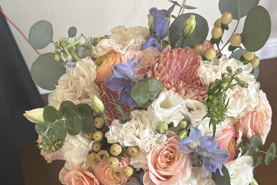 Coral and blue bridal bouquet