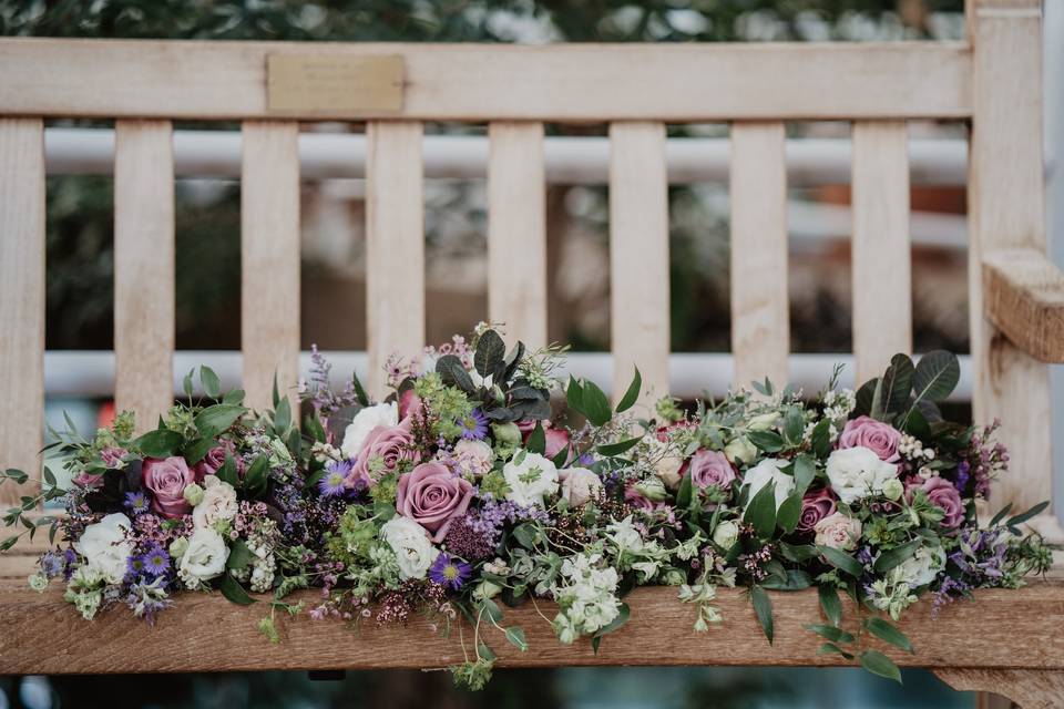 Flowers on a bench