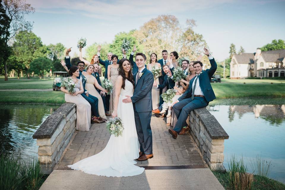 The couple with the bridesmaids and groomsmen