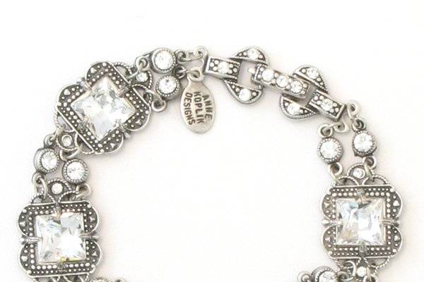 BS 7256 CRY. $100 at annekoplik.com.
This stunning silver bracelet is made of faceted square crystals set in a beautiful silver backing. Small circular crystals attach each piece for an exquisite look! Made with SWAROVSKI ELEMENTS.