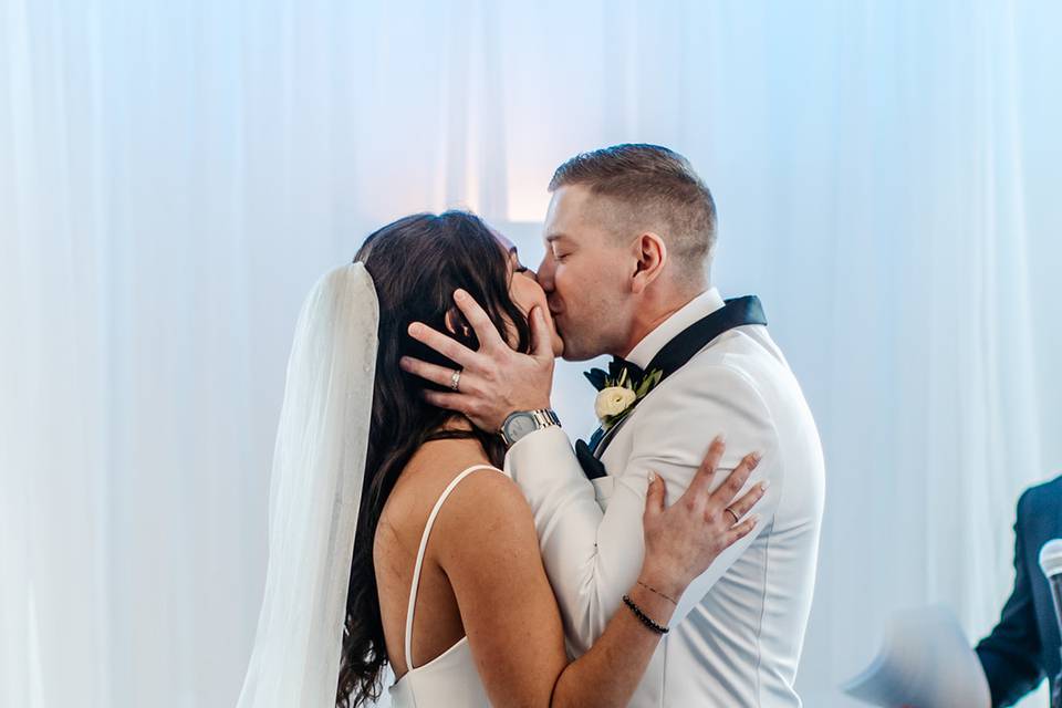 Newlyweds kiss!