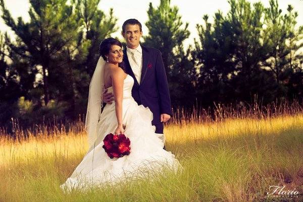 Bride and Groom in a field right after the wedding!