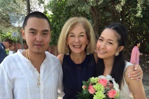 Husband and wife with the officiant