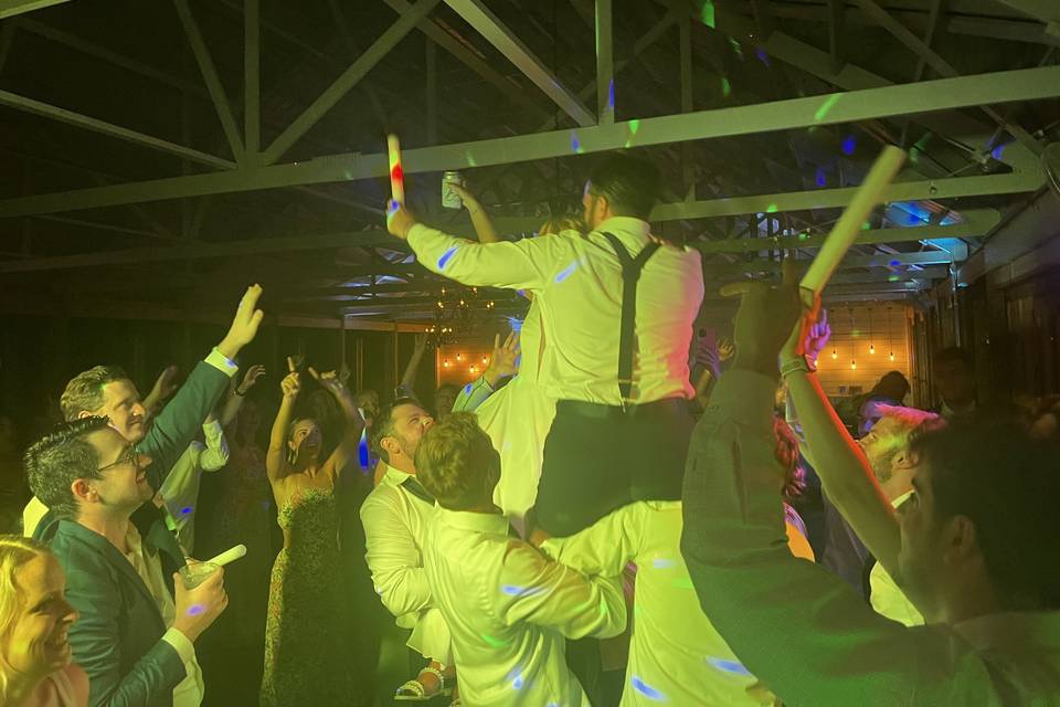 Groom on Shoulders