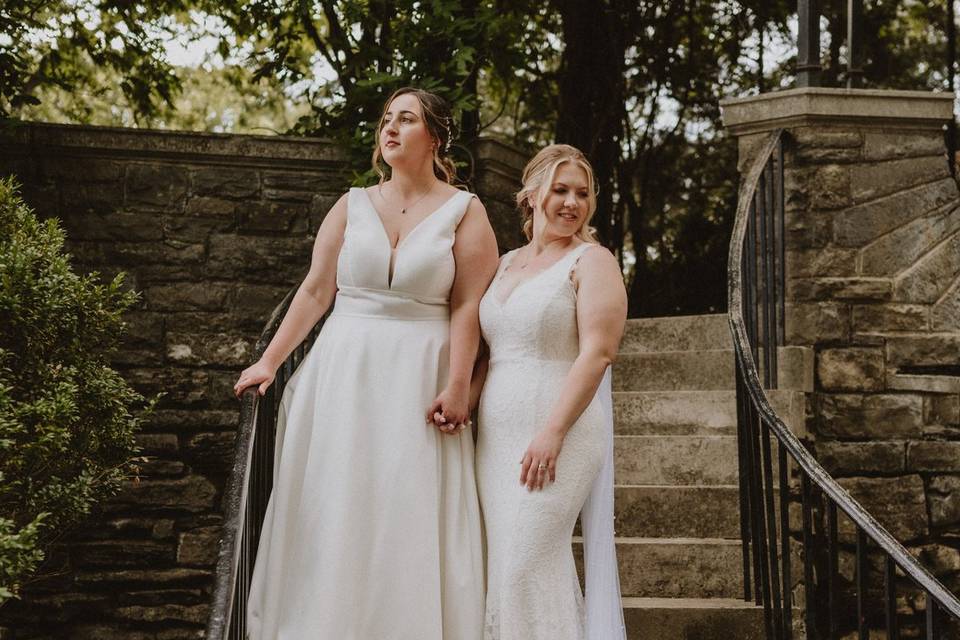 Two brides on a staircase