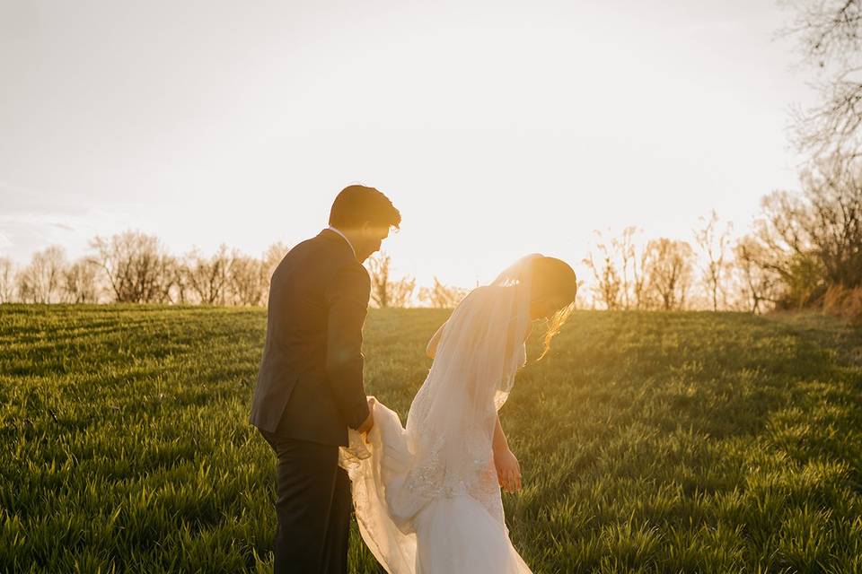 Couple in a sunset field