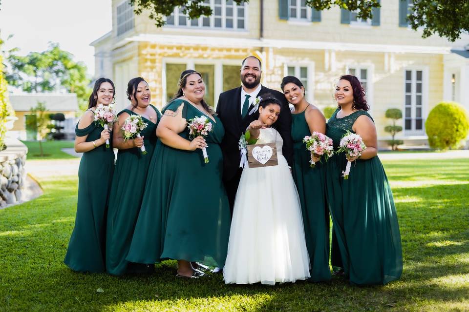 Bridesmaids with groom