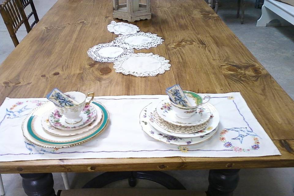 Display at CRUSH vintage Rentals on one of  their superb Farm tables.Lace and embroidered linens with Rustic Farm tables a match made in heaven.