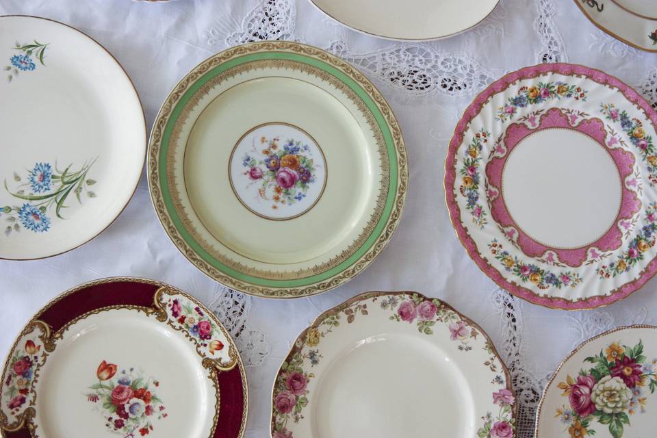 A closeup reveals the beautiful details an these charming dinner Plates