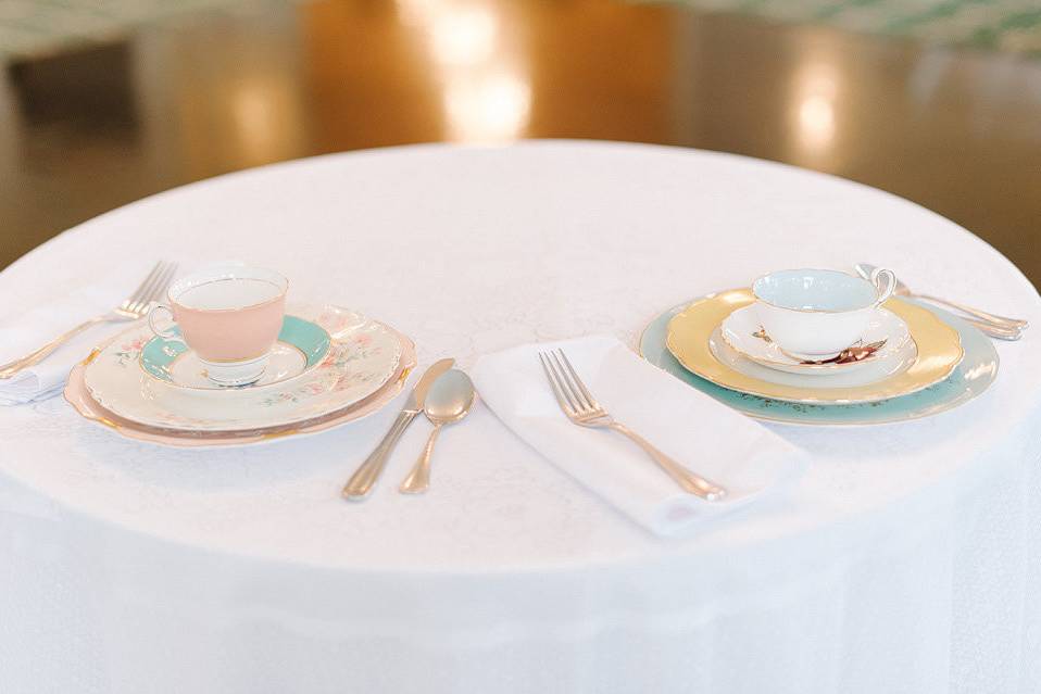 sweetheart table with mismatched vintage fine china