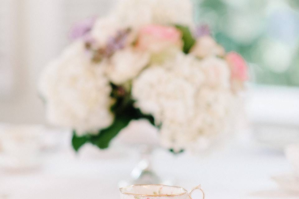 Cup and saucer on top of place settings sets the tone