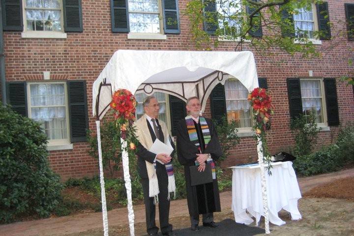 Bride, groom, and the reverend