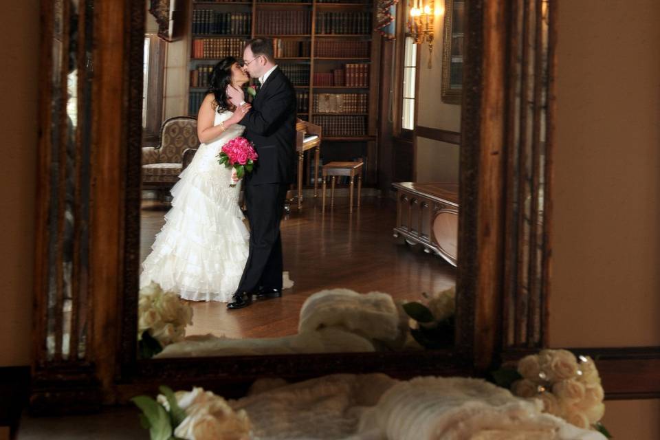 The bride and groom share a moment at the War Memorial in Grosse Pointe, Michigan.