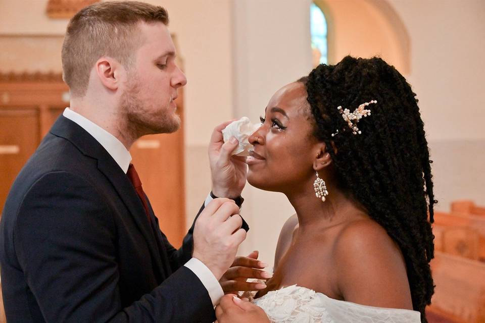 Groom soothing bride