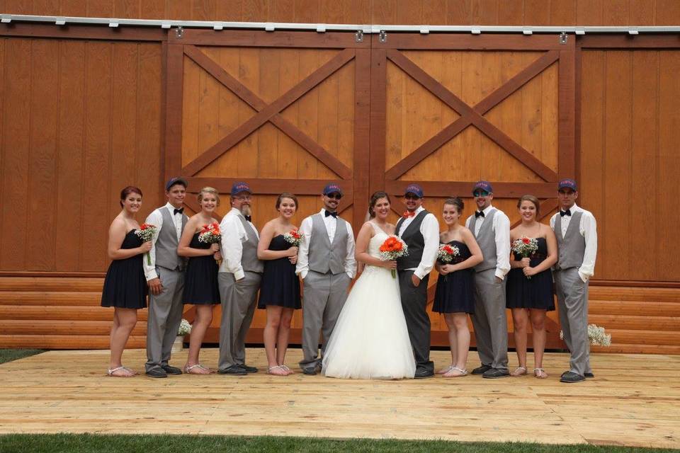 The couple with the bridesmaids and
groomsmen