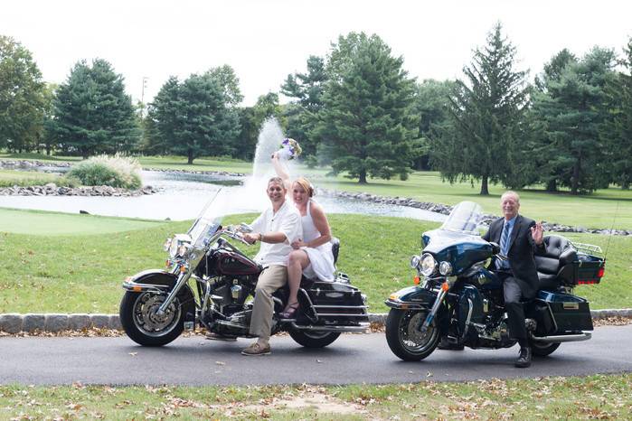 Bride and Groom with the Rev.