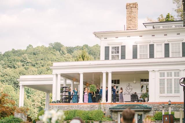 Bride and Groom Waves to Guest