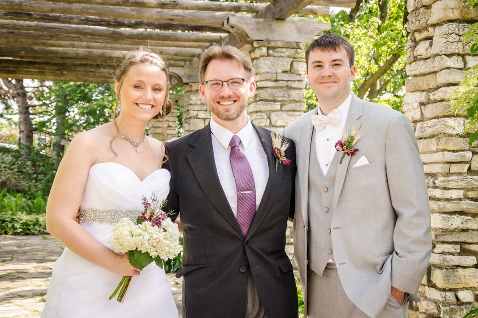 Officiant and the newlyweds