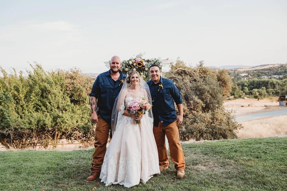 Gregory with the wedding couple