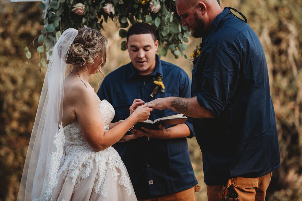 Gregory with the wedding couple