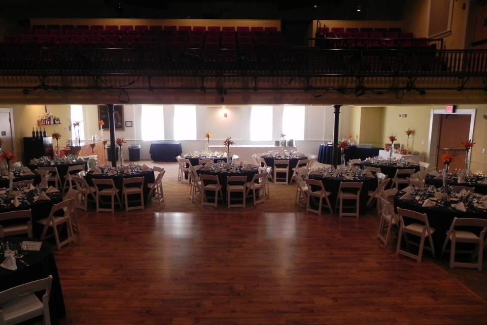 This picture was taken on stage in the Maguire Theater. The dance floor is a permanent fixture, however tables and seating can be placed on the dance floor to accommodate larger parties.