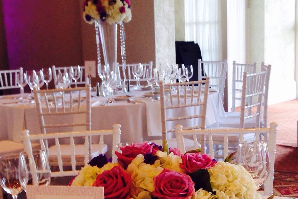 San Francisco Olympic Club wedding with short and tall centerpieces in white and purples.  #SFOlympicClub #purpleweddingflowers #angiezimmermandesigns