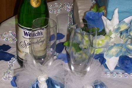 Toasting glasses that match the wedding decor.