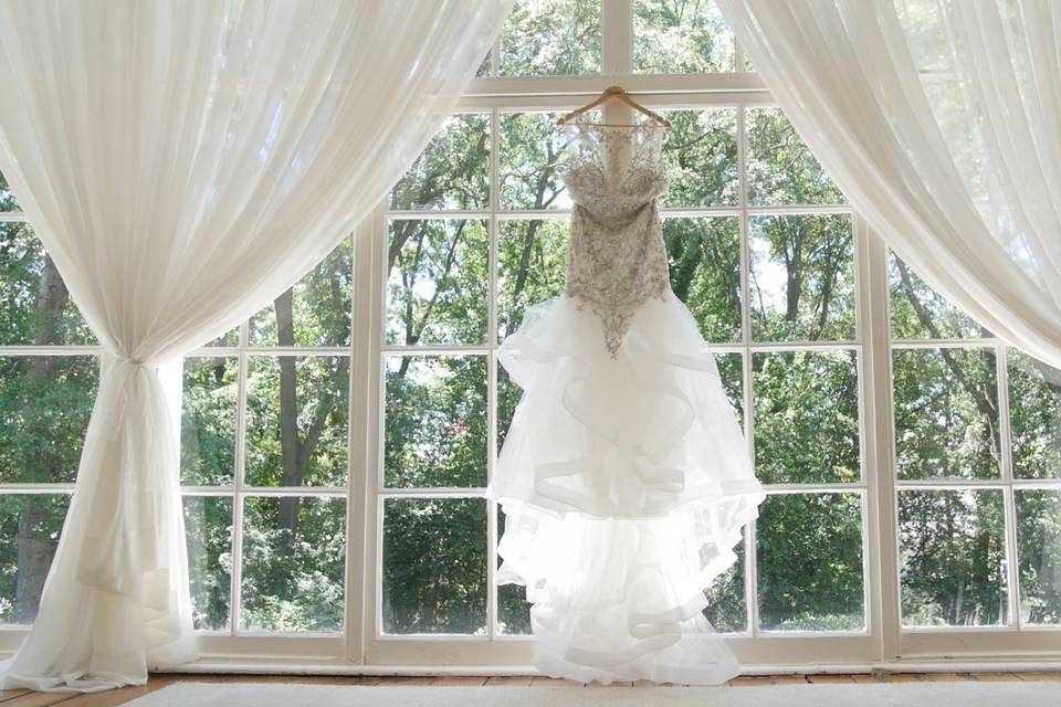 Image of the dress in a window
