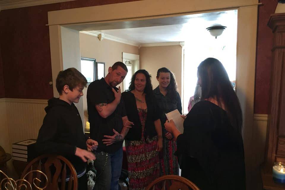 Bride and groom with guests