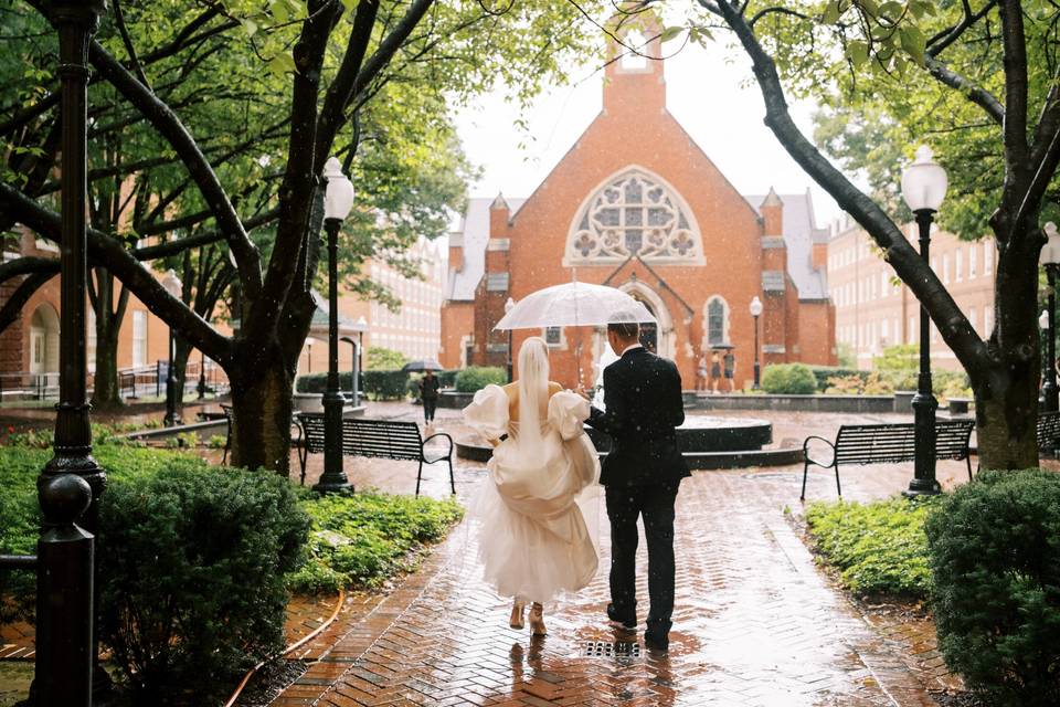 Bride and groom in the rain