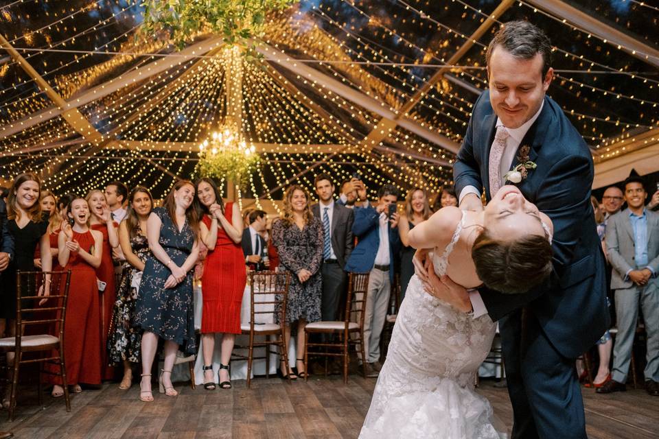 Groom dips bride first dance