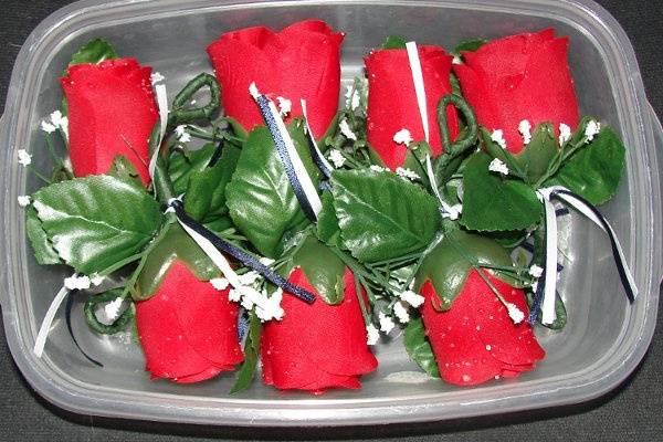 These are the red rose boutonniere's I made for my very own upcoming wedding.