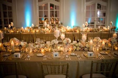 Table setting with floral and candle centerpiece