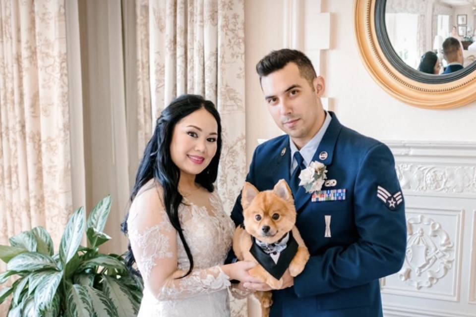 Bride, dog and groom