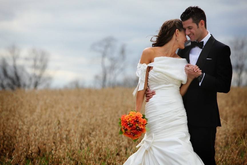Bride and groom in the field