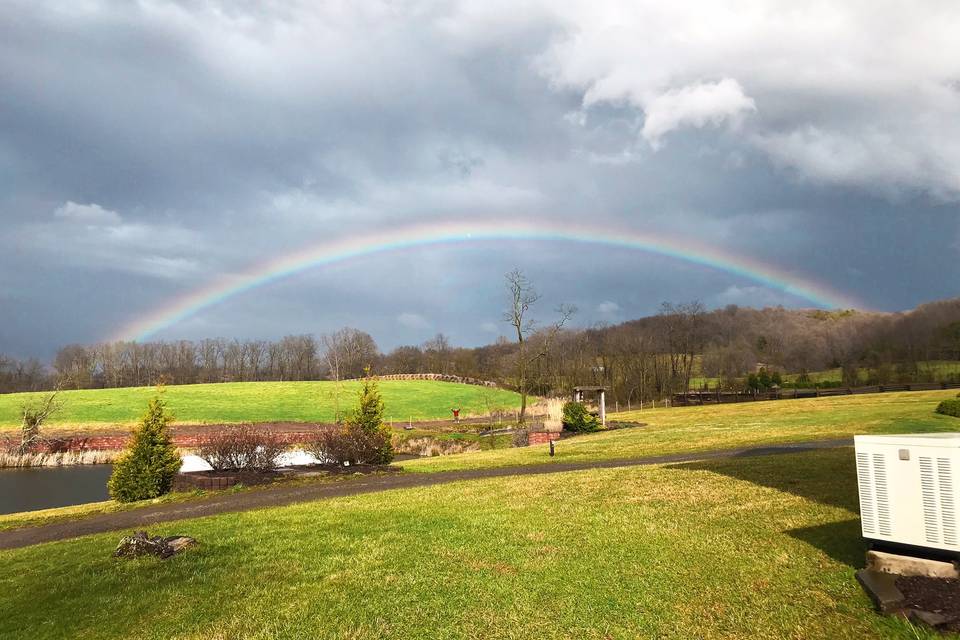 Rainbow over pond