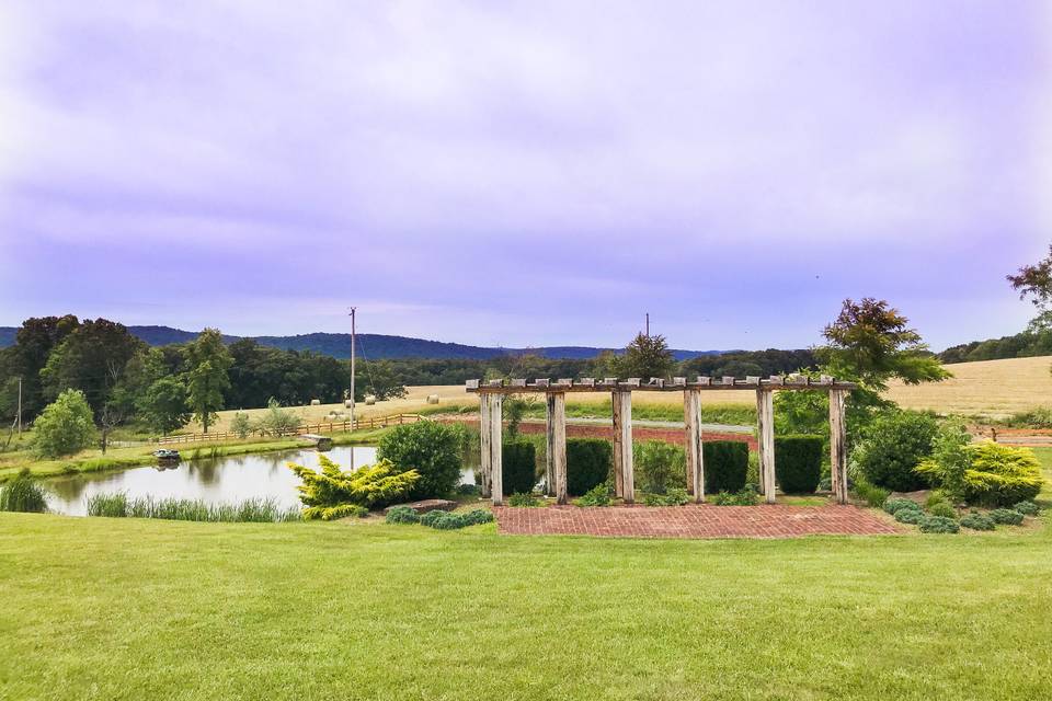 Arbor by the pond