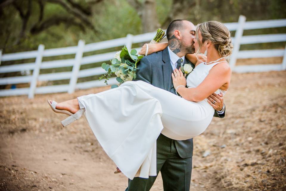 Groom kissing bride