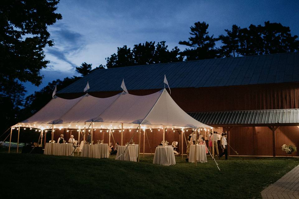 Reception tent setup outside the barn