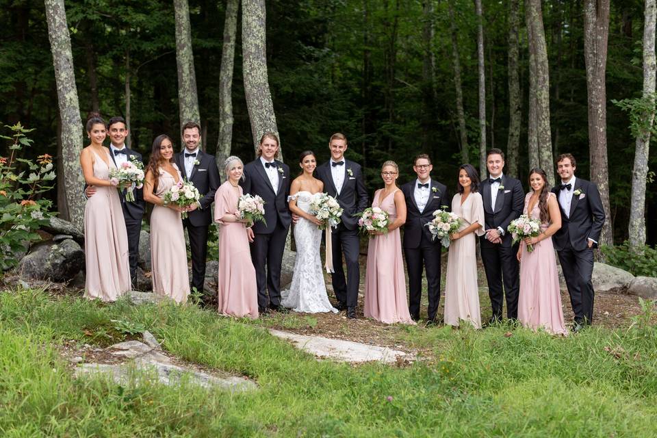 Newlyweds, bridesmaids, and groomsmen