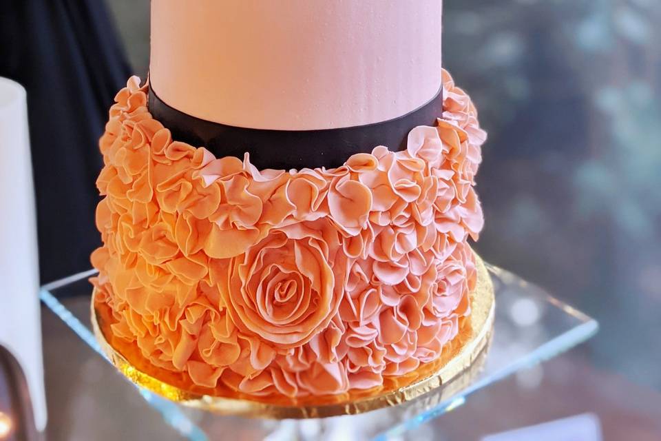 Pink and black ruffle cake