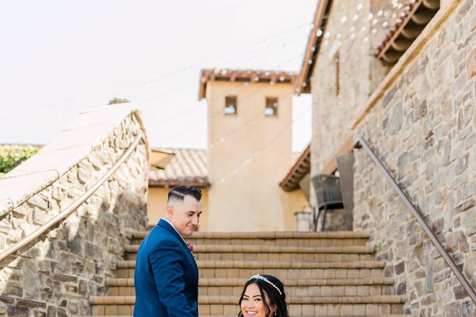 Bride & groom on stairs