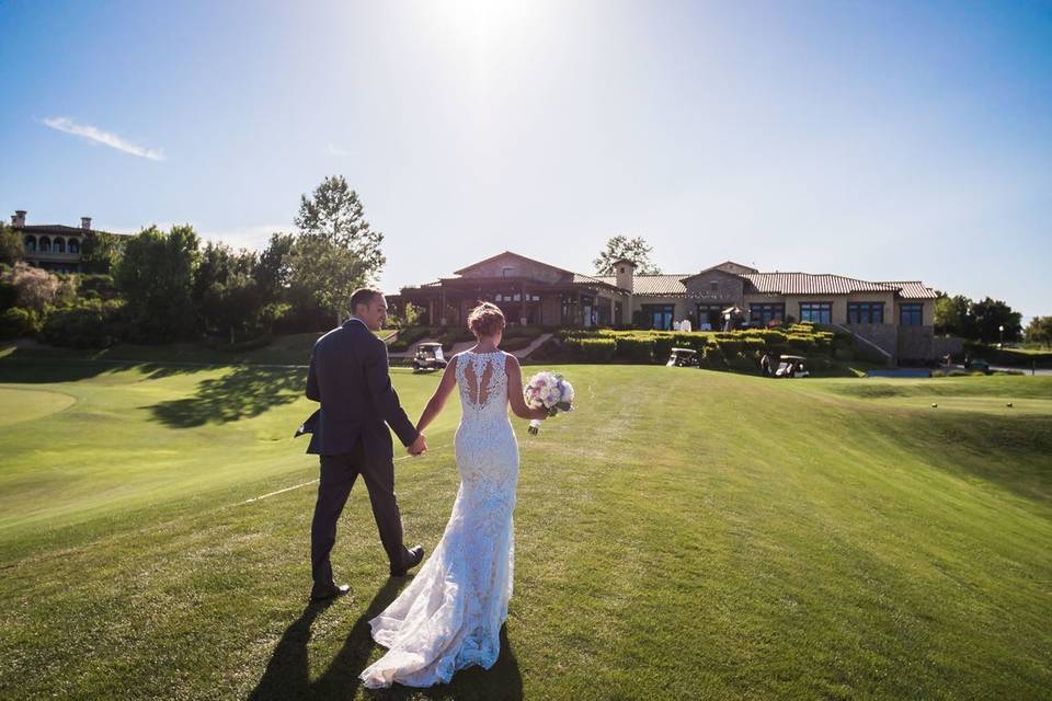 Bride & Groom holding hands