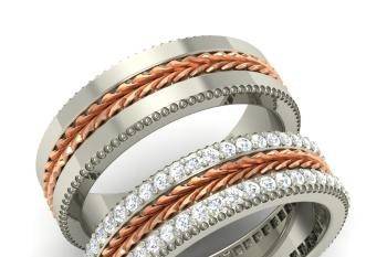 BAND These stylish matching his and hers wedding bands set in two-tone metal are unique as they are beautiful